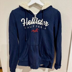 Hollister Navy Blue Sherpa-Lined Zip Hoodie with White and Red Accents